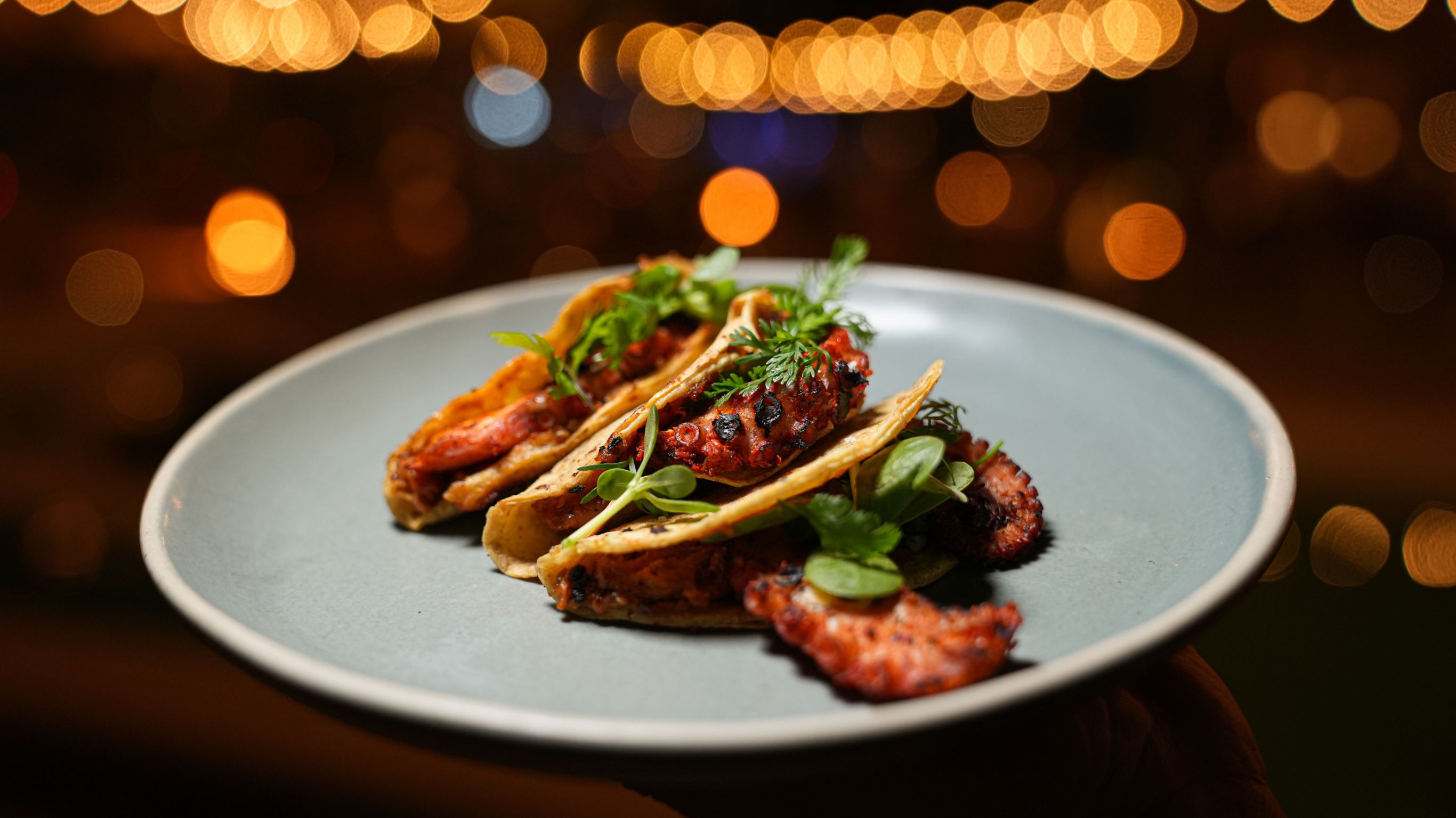 Close up of beverage cart serving beer and tequila at Aquí Me Qudeo food truck, La Cantina 